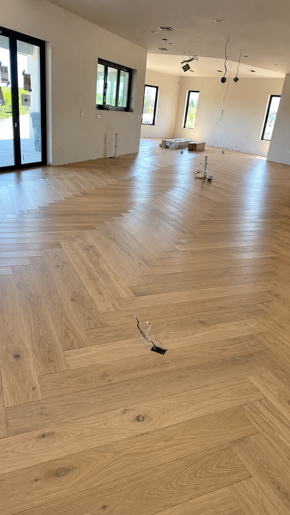 Luxury Herringbone Flooring — custom hardwood by American Apex Construction