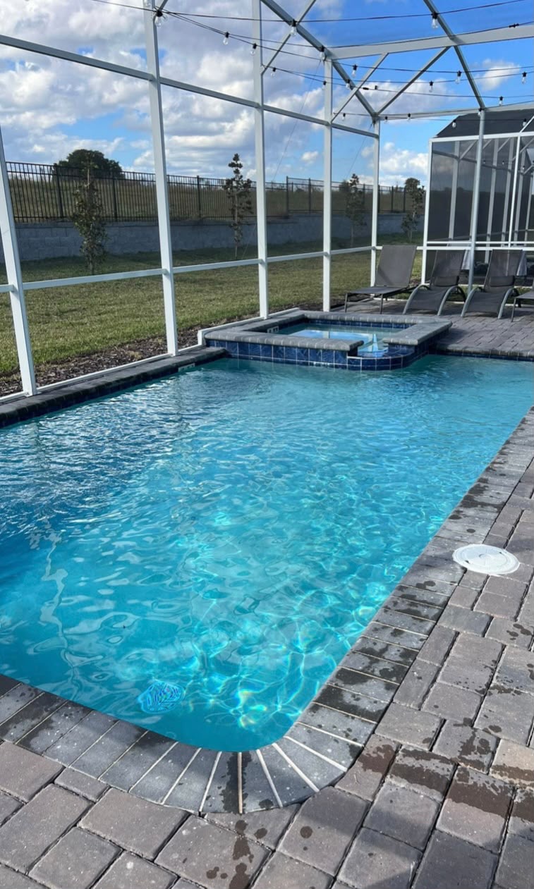 Modern Paver Pool & Spa — pool renovation by American Apex Construction