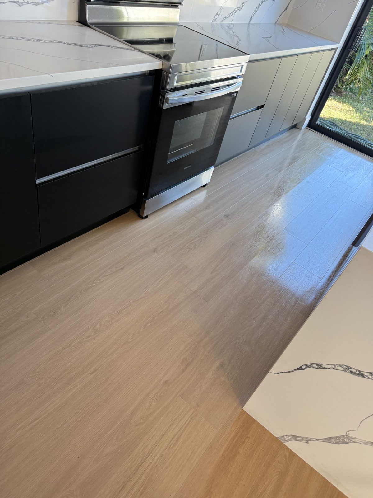 High-Gloss Hardwood Kitchen — Hardwood Flooring by American Apex Construction