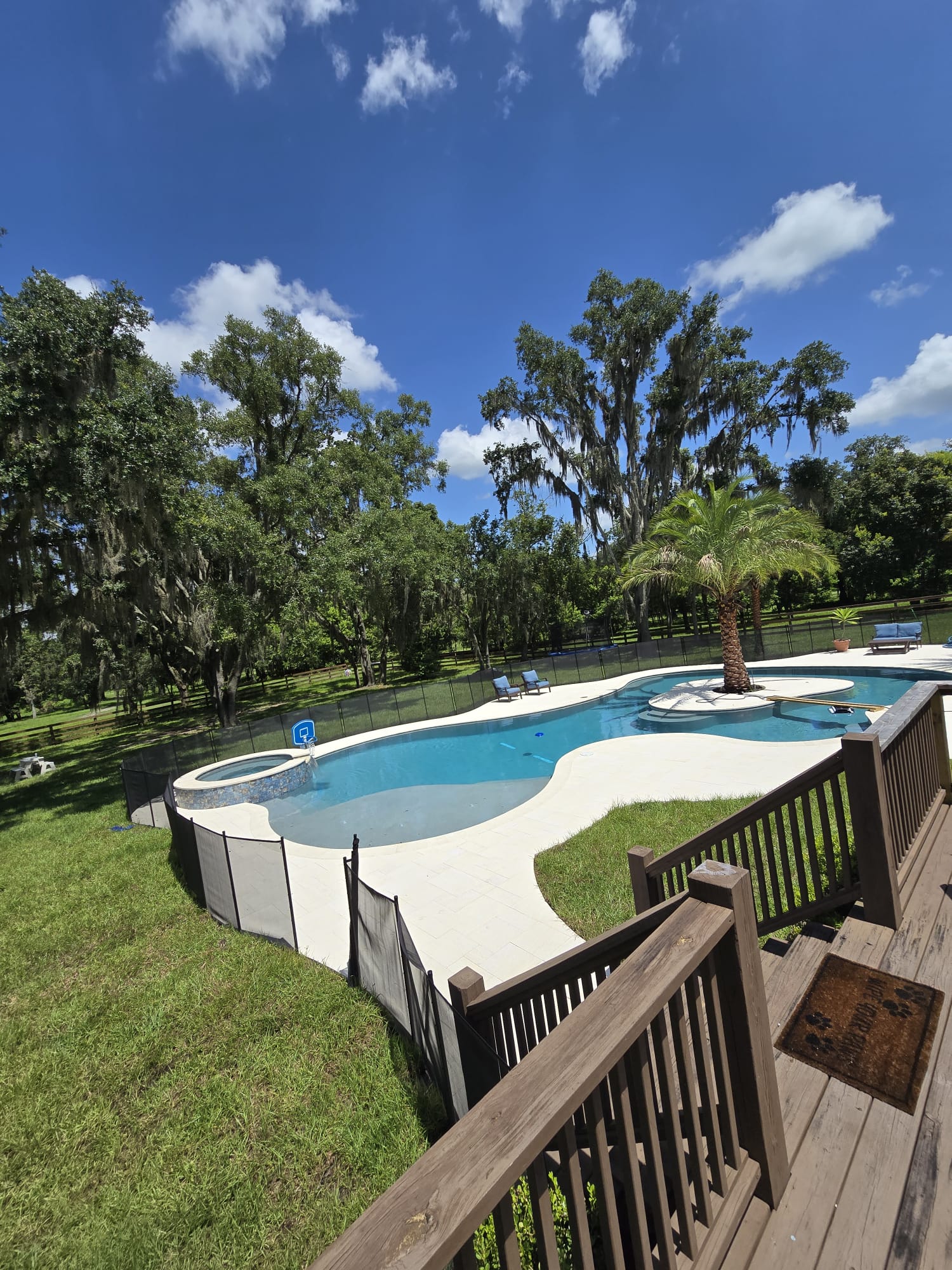 Tropical Island Feature Pool — pool renovation by American Apex Construction